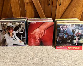 Collection of vinyl LPs.