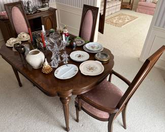 Dining table with two leaves, six chairs, and pads. See photos that follow for more details.