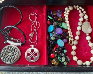 Large selection of vintage jewelry, including a number of sterling silver items and many signed pieces.