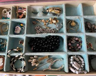 Large selection of vintage jewelry, including a number of sterling silver items and many signed pieces.