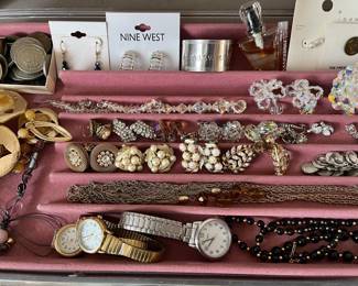 Large selection of vintage jewelry, including a number of sterling silver items and many signed pieces.