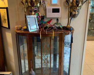 Vintage Art Deco Walnut Liquor / China Cabinet, Venetian Masquerade Masks, and Pair of Tall Candlestick Lamps