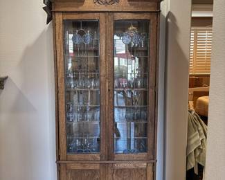 Antique 2 Door hutch. Wine glasses.