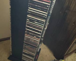CD Storage Tower with Assorted CDs second image