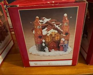 Winsor Collection Church With Two Clock Tower Steeples and Carolers