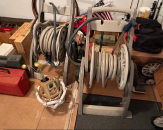 Pair of Suncast Hosemobile Garden Hose Reel Carts