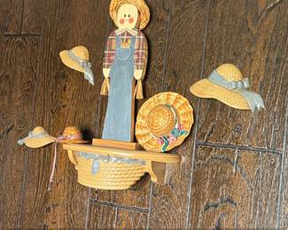 Artificial Holly Garlands and Decorative Straw Hats second image