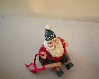 Santa Claus on a Sled Ornament