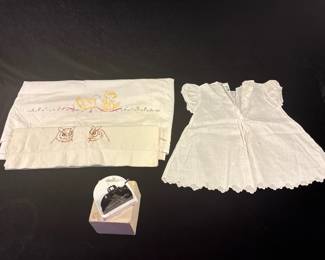 Vintage crib sheet, pillow case, dress and threader.