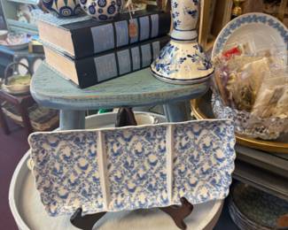 pretty blue and white divided tray, vintage books, candlestick
