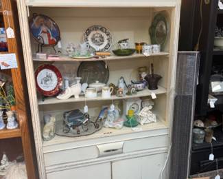 cupboard with collectibles