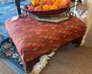 vintage upholstered footstool or ottoman