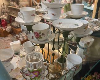 tea cups and saucers on stand
