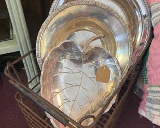 pretty silver platters and a large leaf tray
