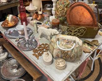 dog figurine, silver platters, copper tray, butterfly wall art