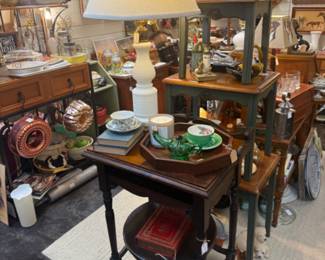 bundt pans, lamp, plant stand