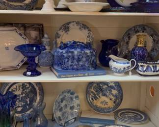 blue and white dishes, white candlesticks