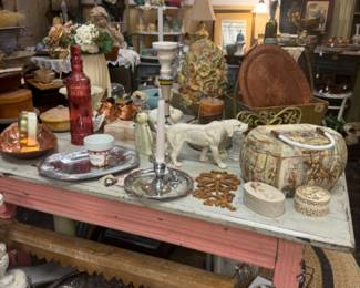 farmhouse pink table, figurines, vintage bottles, silver trays
