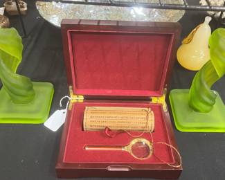 Scroll and magnifying glass