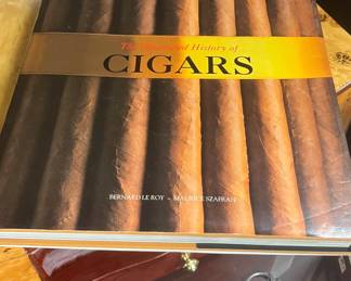 Coffee table book and cigar accessories 