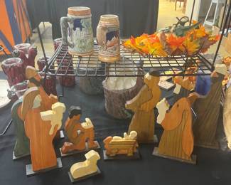 Wooden creche and steins 