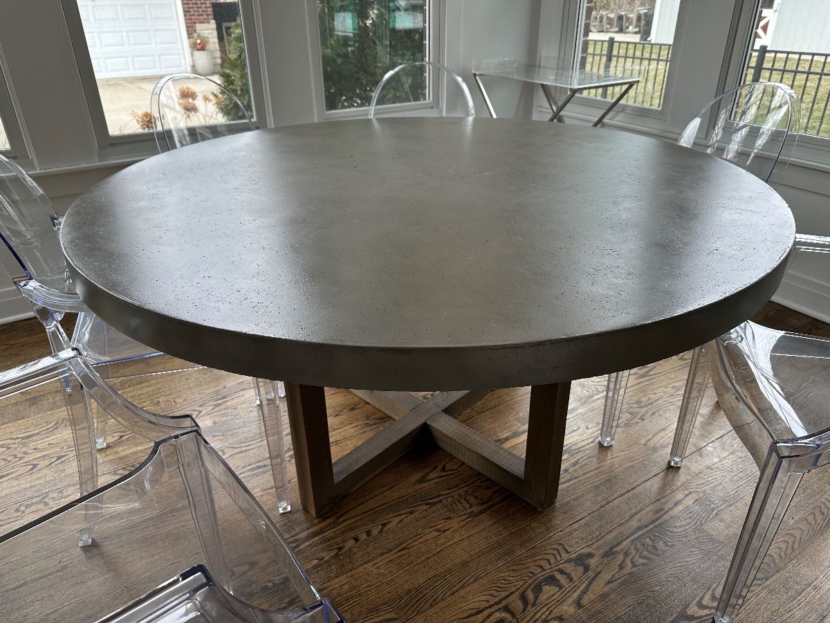 Restoration Hardware 60" diameter Heston Collection dining table. Interlocking pine base with concrete top. $600