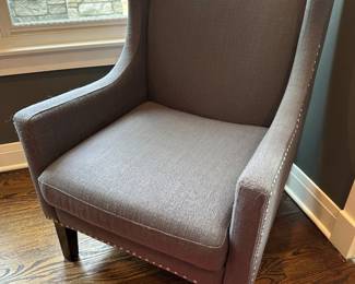 Upholstered armchair 26"W x 28"D x 36"H with an 18" seat height - $100