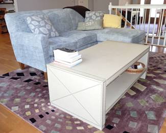 White storage coffee table / blue sofa/lounge - rug