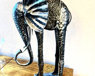 Black and silver tall metal elephant