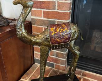 Tall metal camel statue