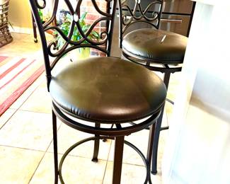 Pair of swirl back bar stools