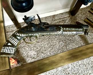 Mother of pearl inlay flintlock pistol