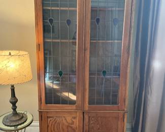 Antique glass door cabinet. Lead glass
