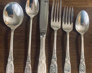 12 six piece place settings with an additional 12 serving pieces ( NO monograms)