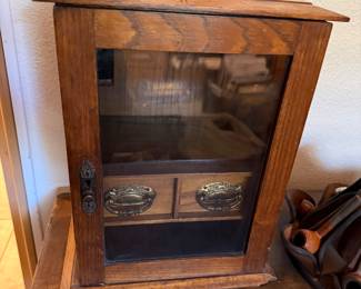 antique oak smoker's cabinet, likely from the Edwardian period circa 1900-1910