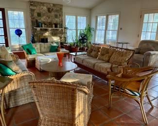 The Sun Room has the rattan. Note: houseplants are not for sale.