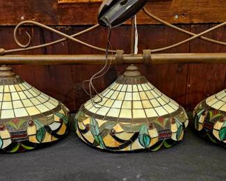 Over the pool table or table