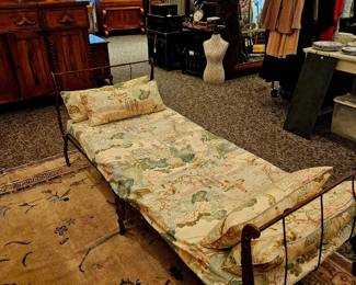 Civil war era folding cot with mattress and chic Asian coverlet and pillows,  surprisingly comfortable 