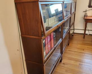 Barrister bookcases by Hale Industries.  Click the link to see RETAIL pricing. These are quality.  https://www.halebookcasesdirect.com/products/314-standard-glass-receding-door-section-large?variant=258998892