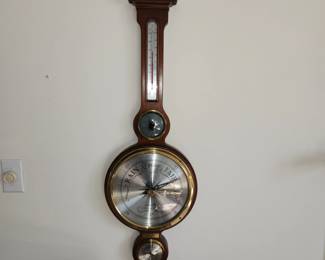 Vintage Howard Miller wall barometer, about 3 feet