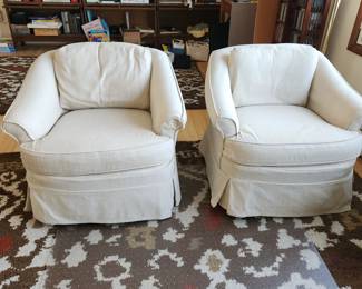 Pair of matching, barrel chairs. New slip covers which match the sofa. Covers have a linen feel, very nice.