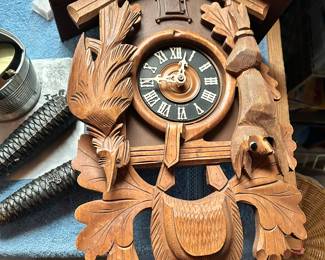Cuckoo Clock with weights and pendulum.  Needs some tlc