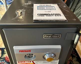 Safe with paperwork and key 