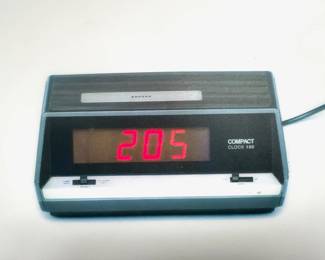 Areaware Flat Life Series Clock By Finn Magee, Vinyl With Working Digital Clock
Lot #: 10
