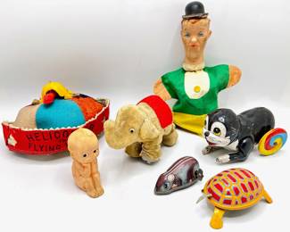 Vintage Toys: 1966 Laurel & Hardy Puppet, Cupie Doll, Wheelie Toys & Beanie
Lot #: 111
