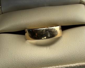This lot features a 14k gold band in a size 8.5 with a total approx. weight of 4.46 grams.


