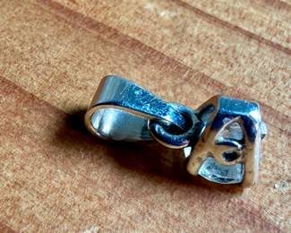 This lot features a 14k white gold pendant with a nearly 1/2 carat diamond. Total approx. weight of 1.18 grams.

