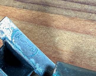 This lot features a necklace and bracelet by Renoir Copper. The necklace measures, 15” and the bracelet, 6.5”. Renoir copper jewelry is a highly collectible mid-century costume line produced by Jerry Fels in California from 1946 to 1964. Renowned for its abstract, modernist, and Arts & Crafts-inspired designs, the company specialized in solid, hand-hammered copper, frequently featuring bold, minimalist forms. 

