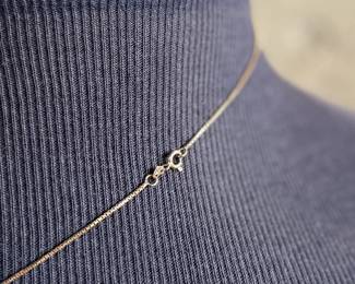 This lot features a stunning diamond heart pendant set in 14k gold on a 14k gold chain. The chain measures, 18” and this piece has a total approx. weight of 8.85 grams. The pendant contains genuine diamonds with a 1.50 carat weight.

