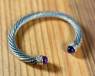 This lot features a bracelet by Alwand Vahan with sterling silver, 14k gold, & amethyst. This piece measures, 7” and has a total approx. weight of 17.77 grams. With origins in Paris, France, Alwand Vahan has been designing fine jewelry for over 100 years, now carried on by third-generation Alwand Vahan, also known as "Sacha."

